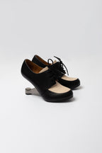 Richelieux à talon sculptural United Nude bicolore noir et beige seconde main