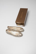 Ballerines dorées Gucci avec détail seconde main 